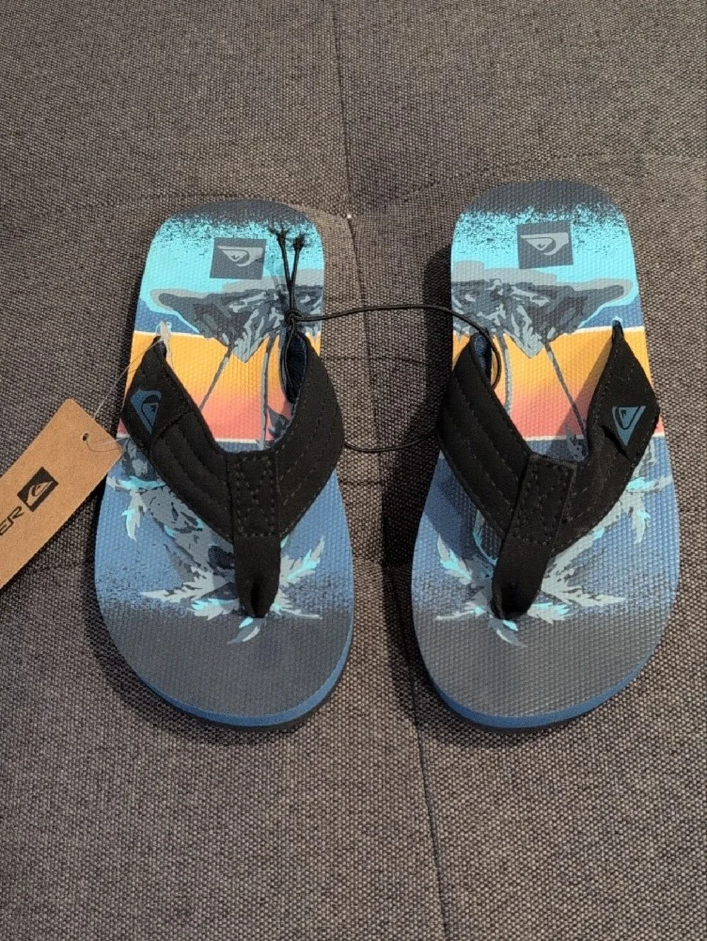 Quiksilver Boys' Black Strapped Flip Flops with Blue and Orange Sunset Print